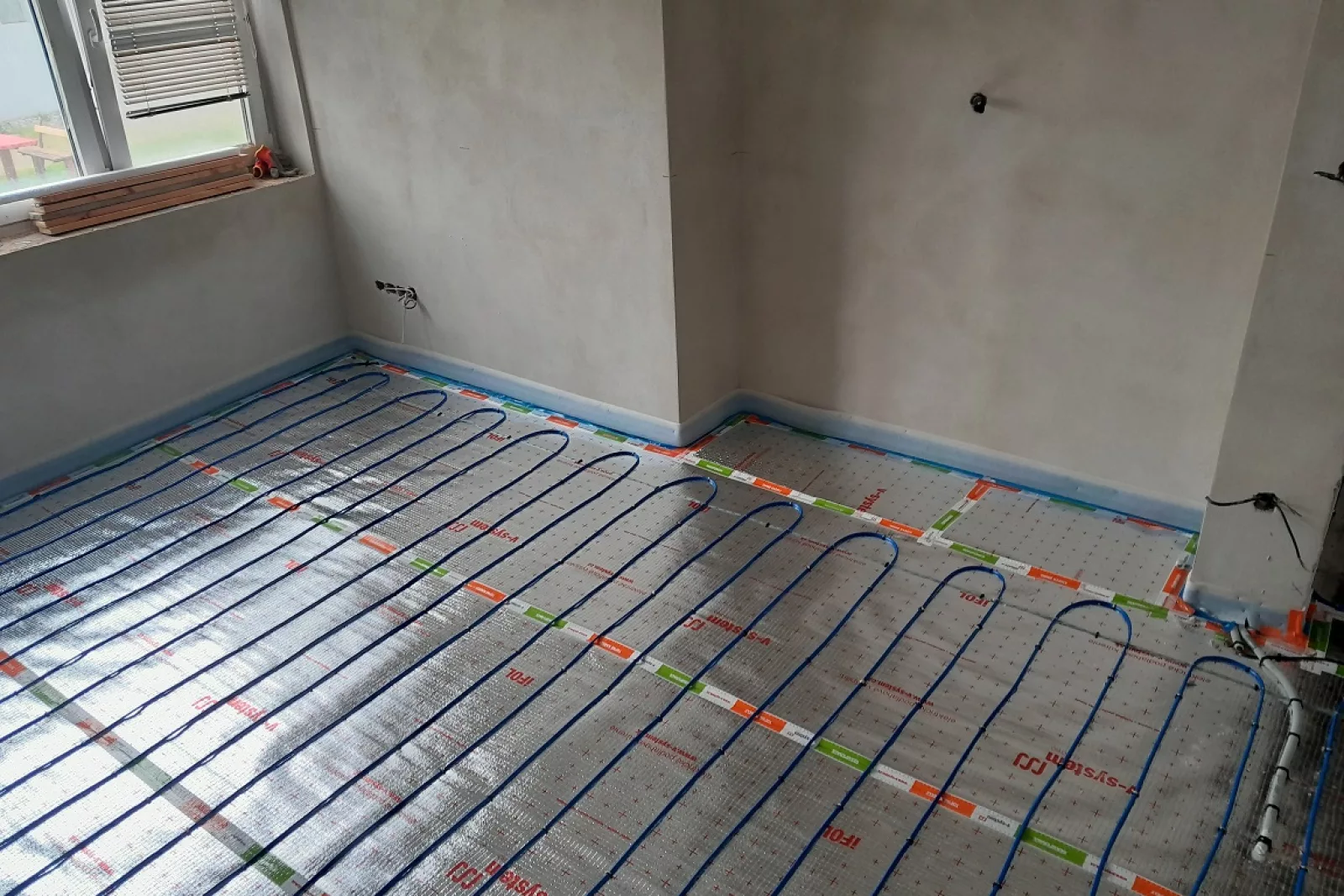 Rekonstrukce bytu Štěpánov - podlahové topení