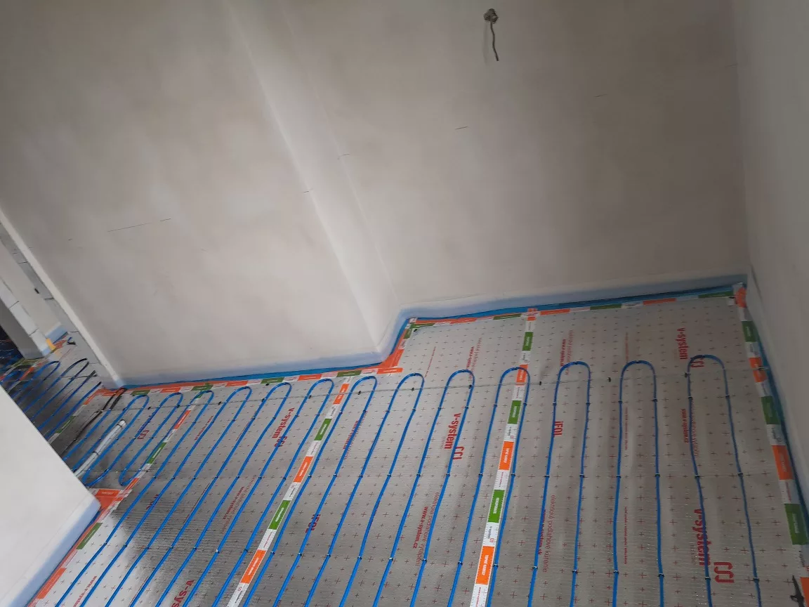 Rekonstrukce bytu Štěpánov - podlahové topení — foto 4