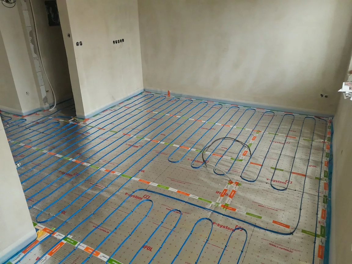 Rekonstrukce bytu Štěpánov - podlahové topení — foto 7